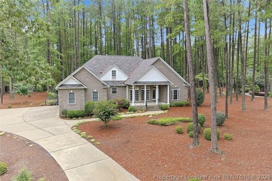 Nestled on a beautifully landscaped 1.17-acre lot in a lovely - photo 1