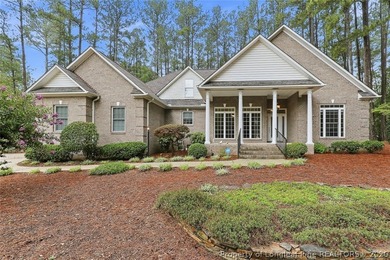 Nestled on a beautifully landscaped 1.17-acre lot in a lovely - photo 2