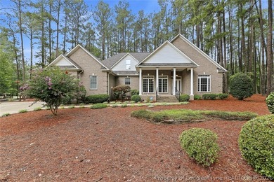 Nestled on a beautifully landscaped 1.17-acre lot in a lovely - photo 4