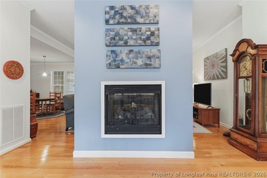 Nestled on a beautifully landscaped 1.17-acre lot in a lovely - photo 9