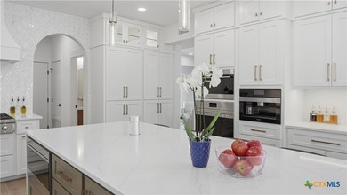 Welcome to 8711 Deer Leap, an extraordinary luxury estate on a - photo 15