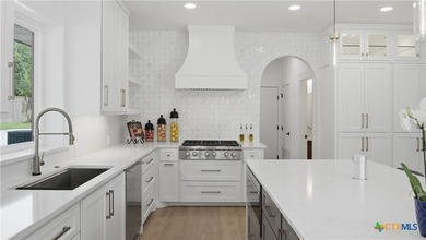Welcome to 8711 Deer Leap, an extraordinary luxury estate on a - photo 16