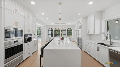 Welcome to 8711 Deer Leap, an extraordinary luxury estate on a - photo 19
