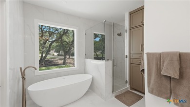 Welcome to 8711 Deer Leap, an extraordinary luxury estate on a - photo 30