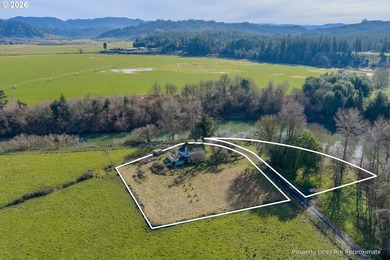 Motivated seller! This family property on the Coquille River is - photo 2