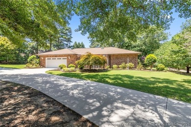 Welcome to 88 Traceway, a spacious all-brick, single-story - photo 3