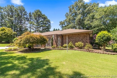Welcome to 88 Traceway, a spacious all-brick, single-story - photo 6