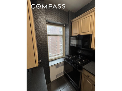 8E is a beautifully appointed studio apartment offering a - photo 3