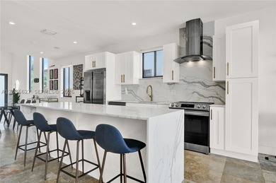 Fully remodeled villa-style residence in the highly desirable - photo 33