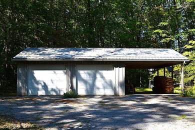 Nestled in the woods on a peaceful 3.169-acre lot, this inviting - photo 12