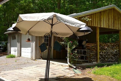 Nestled in the woods on a peaceful 3.169-acre lot, this inviting - photo 13