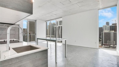 Beautiful 2 bedroom/2 bathroom loft style corner unit located in