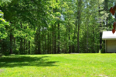Nestled in the woods on a peaceful 3.169-acre lot, this inviting - photo 22