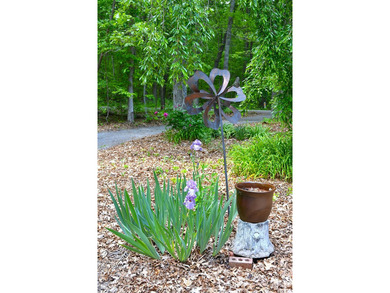 Nestled in the woods on a peaceful 3.169-acre lot, this inviting - photo 28