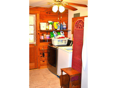 Nestled in the woods on a peaceful 3.169-acre lot, this inviting - photo 36