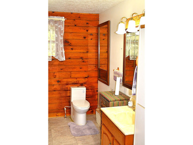 Nestled in the woods on a peaceful 3.169-acre lot, this inviting - photo 39