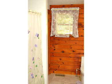 Nestled in the woods on a peaceful 3.169-acre lot, this inviting - photo 40