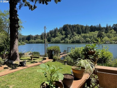 WATERFRONT ADVENTURE AWAITS ON SILTCOOS LAKE Ready to trade the - photo 32