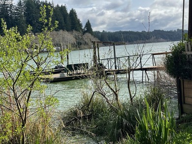 WATERFRONT ADVENTURE AWAITS ON SILTCOOS LAKE Ready to trade the - photo 33