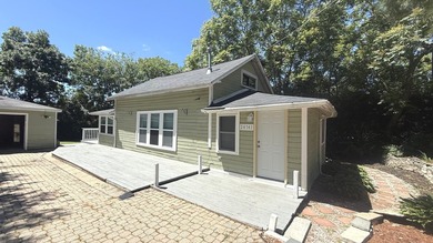 Enjoy the perfect blend of privacy and lake-area living in this - photo 1
