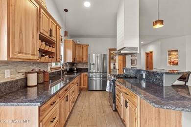 Nestled on 4.5 flat & private acres in Athol, just minutes from - photo 3