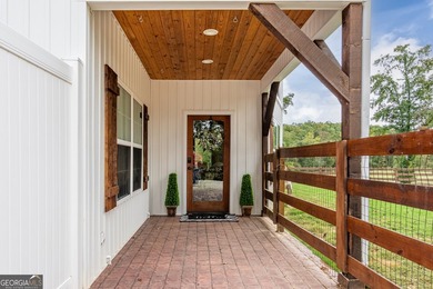 Welcome to a rare, turn-key equestrian estate offering a fully - photo 3