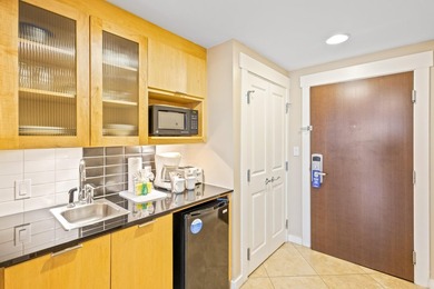Escape to this fully furnished, groundfloor unit in sought-after - photo 35