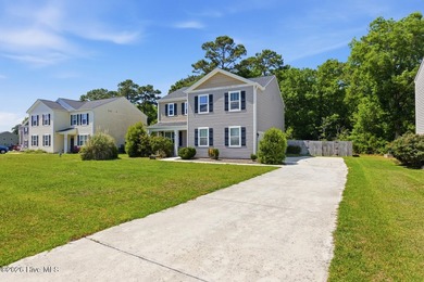 Discover this four-bedroom, 2.5-bath home in Holly Ridge, NC - photo 3