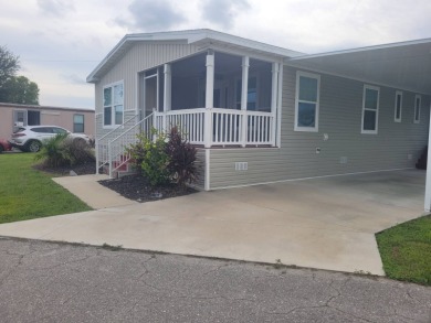 Lake Home For Sale in North Fort Myers, Florida