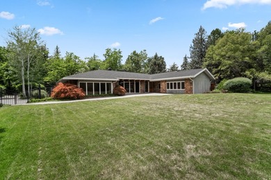 Tucked away behind a private tree-lined drive in one of - photo 3