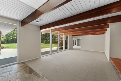 Tucked away behind a private tree-lined drive in one of - photo 7