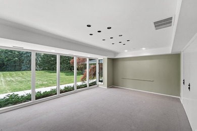 Tucked away behind a private tree-lined drive in one of - photo 9
