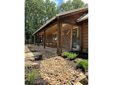 Rustic charm meets modern comfort in this beautifully log cabin - photo 32