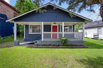 INVESTMENT OPPORTUNITY IN THE HEART OF MOBILE! This previously - photo 1