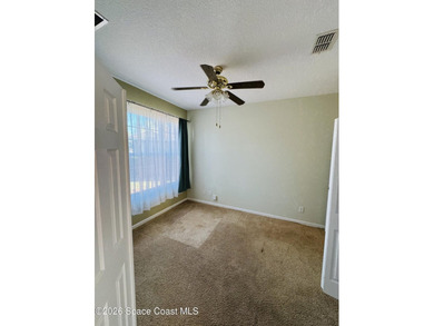 Located in the gated Bayside Lakes community, this spacious 3 - photo 5