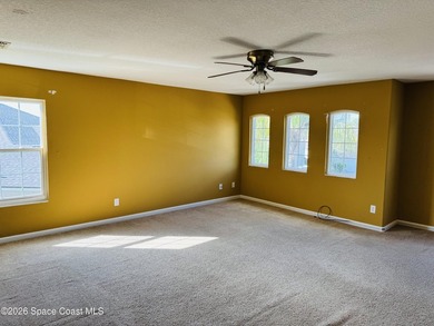 Located in the gated Bayside Lakes community, this spacious 3 - photo 9