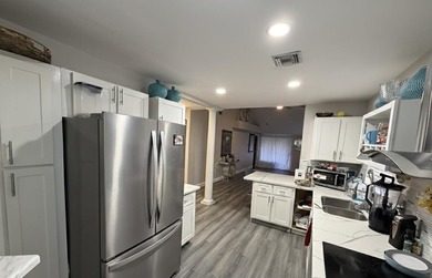 Step into this charming 2-story, 3-bedroom, 2.5-bath villa - photo 3