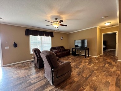 Well-maintained home on approximately 6 acres with a stocked