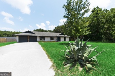 Plenty of space welcomes you in this 4/5 bedroom 2.5 bath home - photo 3