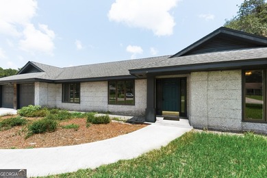 Plenty of space welcomes you in this 4/5 bedroom 2.5 bath home - photo 4