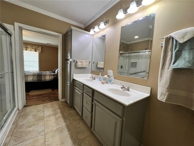 Well-maintained home on approximately 6 acres with a stocked