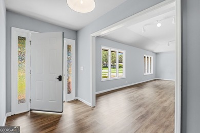 Plenty of space welcomes you in this 4/5 bedroom 2.5 bath home - photo 6