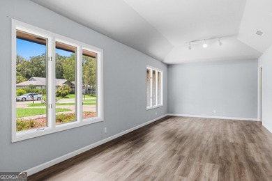 Plenty of space welcomes you in this 4/5 bedroom 2.5 bath home - photo 7