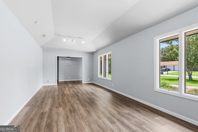 Plenty of space welcomes you in this 4/5 bedroom 2.5 bath home - photo 8