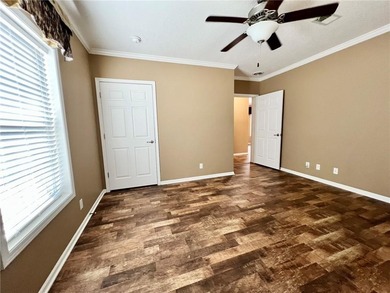 Well-maintained home on approximately 6 acres with a stocked