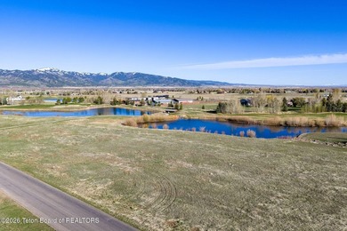 44 acre lot backing up to the par 3 course and pond, this - photo 22