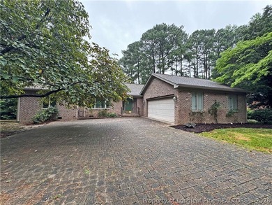 Enjoy peaceful waterfront living in this full-brick, 3-bedroom - photo 2