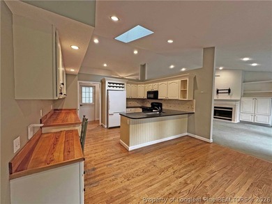 Enjoy peaceful waterfront living in this full-brick, 3-bedroom - photo 8