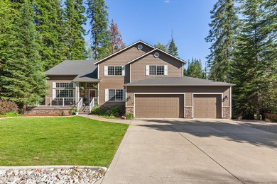 This spacious 6 BR/4 BA home is situated on nearly an acre in - photo 1