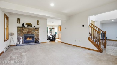 WELCOME TO 104 WOLF HOLLOW RD, A GOLF LOVERS DREAM!! This